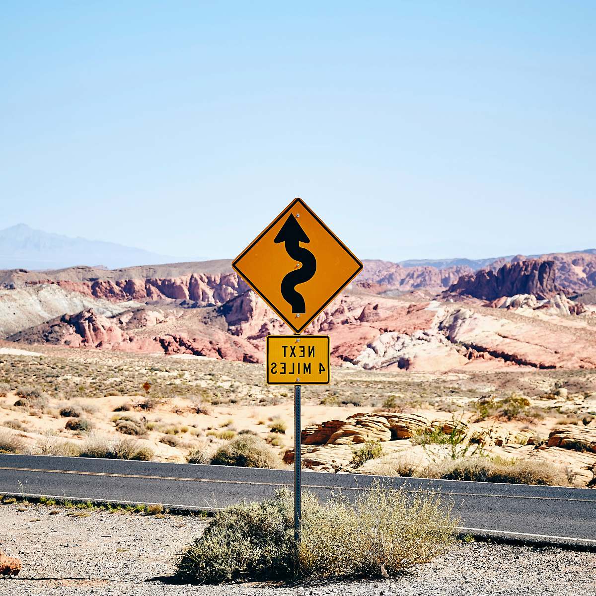 sign curve road signage street sign